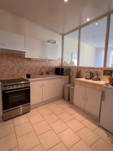 Chambre privative au calme en plein centre avec balcon