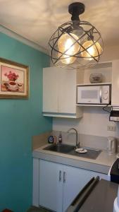 Go to AG0DA app San Remo Oasis Studio Type for booking thanks