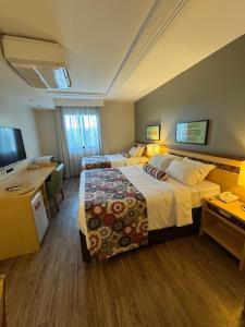 Alto Padrão - Cama Queen e Viuvão no Hotel Lets Idea