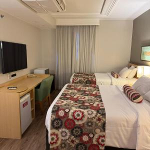 Alto Padrão - Cama Queen e Viuvão no Hotel Lets Idea