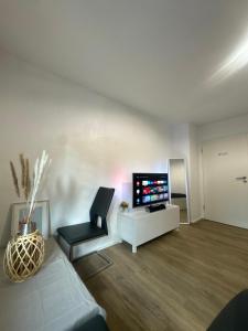 Modernes 1-Zimmer Appartment- mit Doppelbett und Smart-TV