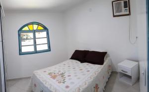 Casa com amplo quintal, churrasqueira e área verde