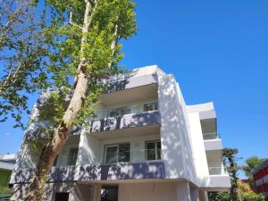 Renovated flat with private fenced garden in Bibione