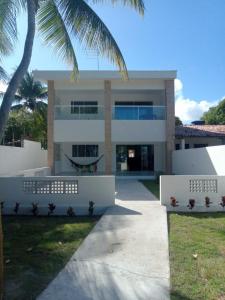 Flat catuama a beira mar