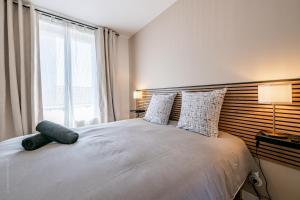 Appartements Calme et Cosy en centre ville : photos des chambres