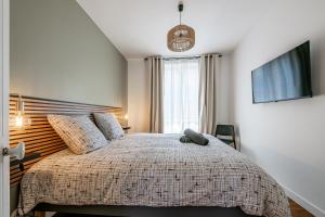 Appartements Calme et Cosy en centre ville : photos des chambres