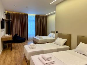 Andi Downtown Deluxe Rooms