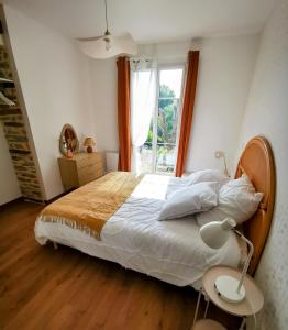 Appartements La Basque - un balcon au coeur de La Gacilly : photos des chambres