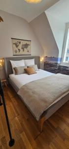 Maisons de vacances La Maison de pecheur typique au Guilvinec - A 100 m de la mer - Tout a pied, plage, port, commerces- Wifi inclus - Linge de lit inclus - Jardin clos - En option , menage et serviettes : photos des chambres