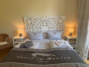 Wellenklang - Luxusbungalow mit Rosengarten