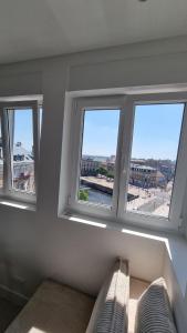 Appartements Sur la savoureuse - Le 54 : photos des chambres