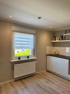 Appartement 2 - Gemütliche Wohnung mit Küchenzeile, Bad und großer Terrasse