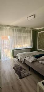 Appartement 2 - Gemütliche Wohnung mit Küchenzeile, Bad und großer Terrasse