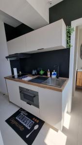 Appartements Sur la savoureuse - Le 21 : photos des chambres