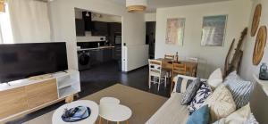 Spacieux 2 pièces avec terrasse, clim et parking