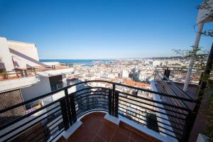 Cross views city, sea