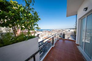 Cross views city, sea