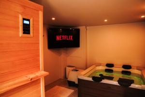 Appartements Le Cocon Art & Spa : photos des chambres