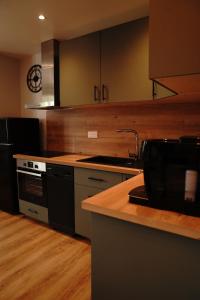 Appartements Le Cocon Art & Spa : photos des chambres