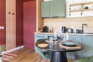 Appartements La Cachette des amoureux balneo en duo : photos des chambres