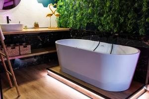 Appartements La Cachette des amoureux balneo en duo : photos des chambres