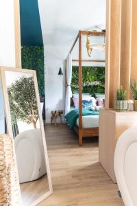 Appartements La Cachette des amoureux balneo en duo : photos des chambres