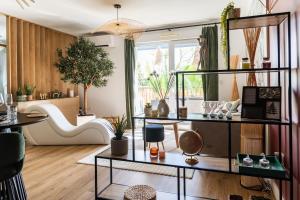 Appartements La Cachette des amoureux balneo en duo : photos des chambres
