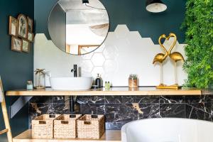 Appartements La Cachette des amoureux balneo en duo : photos des chambres