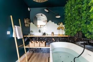 Appartements La Cachette des amoureux balneo en duo : photos des chambres