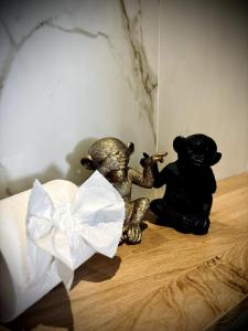 Appartements La Charmeuse, suite luxueuse romantique & spa : photos des chambres