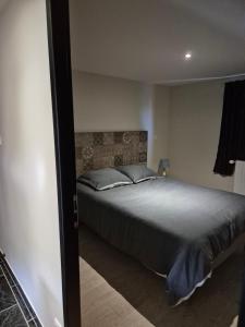 Appartements Logement independant au rdc d-une maison : photos des chambres