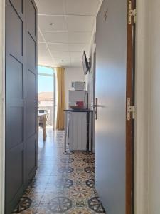 Appartements Charmant studio avec piscine : photos des chambres