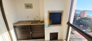 Apartamento com Vista Mar na Zona Central da Praia com 02 Dormitórios