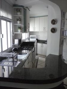 Apartamento no centro, bem localizado, na praia