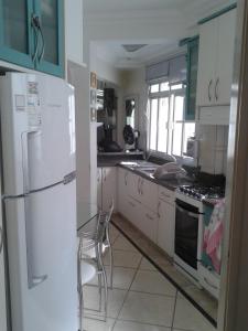 Apartamento no centro, bem localizado, na praia