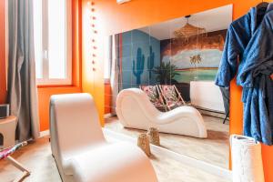 Appartements La Caliente love room glamour balneo en duo : photos des chambres