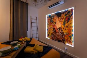 Appartements La Caliente love room glamour balneo en duo : photos des chambres