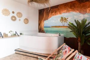 Appartements La Caliente love room glamour balneo en duo : photos des chambres