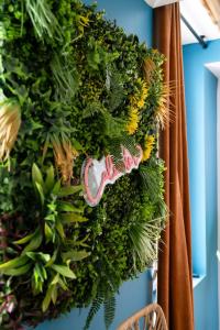 Appartements La Caliente love room glamour balneo en duo : photos des chambres