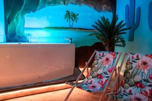 Appartements La Caliente love room glamour balneo en duo : photos des chambres