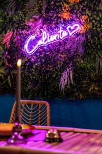 Appartements La Caliente love room glamour balneo en duo : photos des chambres