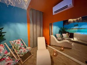 Appartements La Caliente love room glamour balneo en duo : photos des chambres