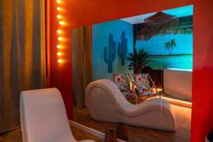 Appartements La Caliente love room glamour balneo en duo : photos des chambres