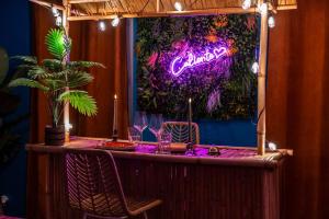 Appartements La Caliente love room glamour balneo en duo : photos des chambres