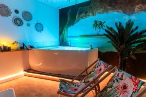 Appartements La Caliente love room glamour balneo en duo : photos des chambres