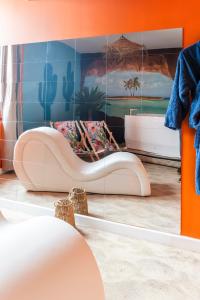 Appartements La Caliente love room glamour balneo en duo : photos des chambres