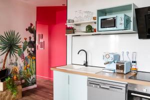 Appartements La Caliente love room glamour balneo en duo : photos des chambres