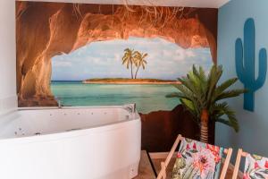 Appartements La Caliente love room glamour balneo en duo : photos des chambres