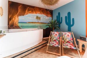 Appartements La Caliente love room glamour balneo en duo : photos des chambres