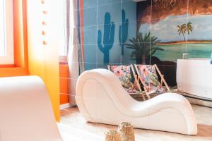 Appartements La Caliente love room glamour balneo en duo : photos des chambres